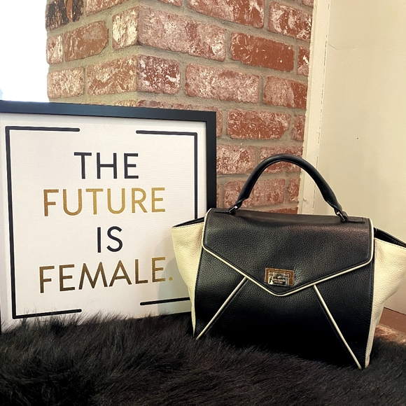 kate spade Handbags - Kate Spade black and white buckle envelope bag